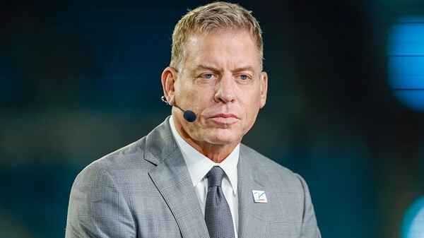 Is Troy Aikman suing Andy Reid?